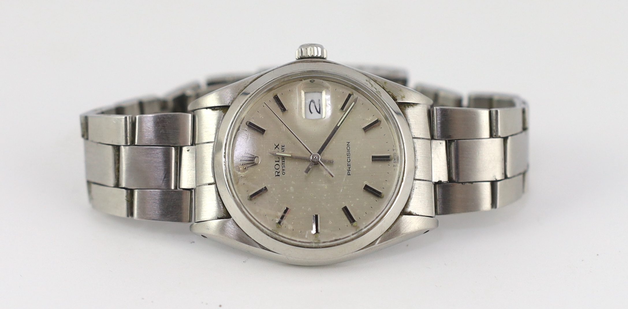 A gentleman's early 1970's stainless steel Rolex Oysterdate Precision manual wind wrist watch, on a stainless steel Rolex bracelet